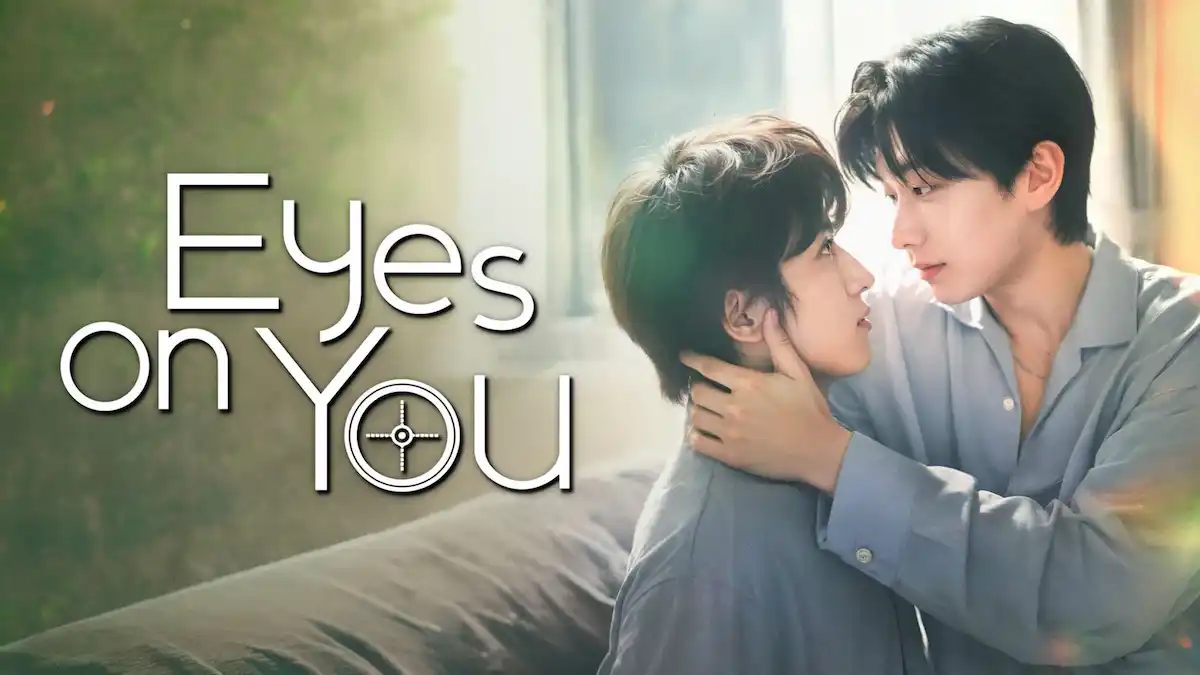 Close-up portrait of two male leads in an Asian BL romance drama sharing an intimate gaze indoors